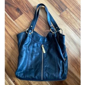 Black leather Michael Kors shoulder bag.